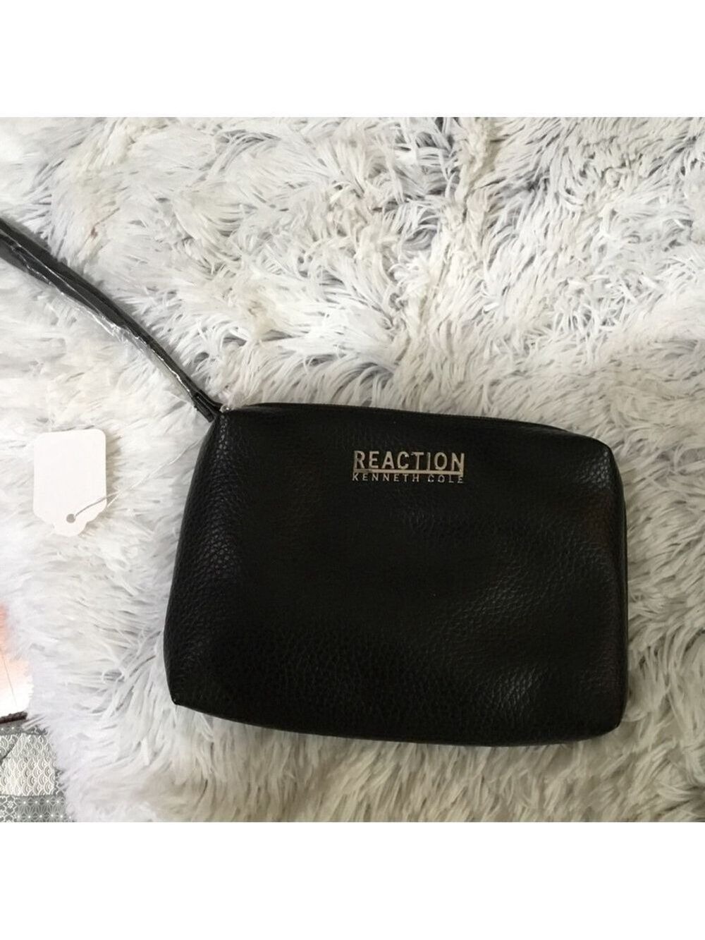 Kenneth Cole Reaction black cosmetic or wristlet black faux leather